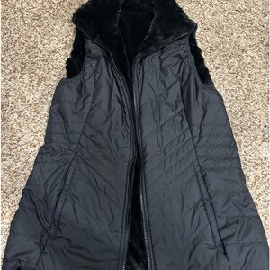 Black reversible north face vest. Only worn a handful of times
